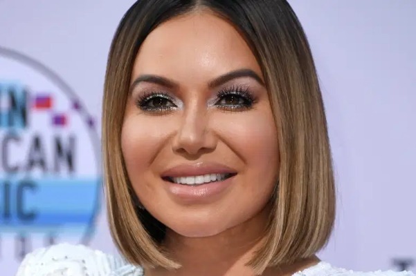 A person smiling for the camera

Description automatically generated with medium confidence