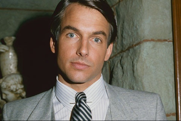 A person in a suit and tie

Description automatically generated with medium confidence