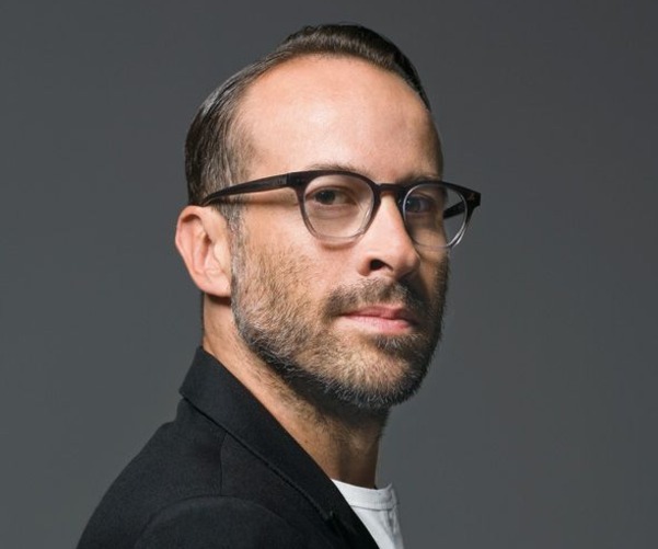 A person with glasses and a beard

Description automatically generated with low confidence