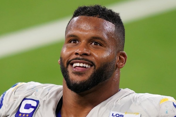 A picture containing grass, person, outdoor, sport

Description automatically generated