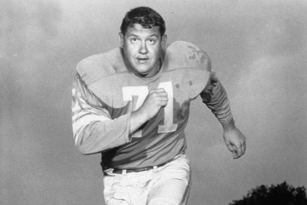 A picture containing text, person, wall, person

Description automatically generated